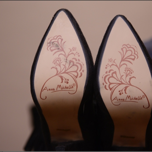 Black faux suede fringe booties. Worn once. - Picture 4 of 4